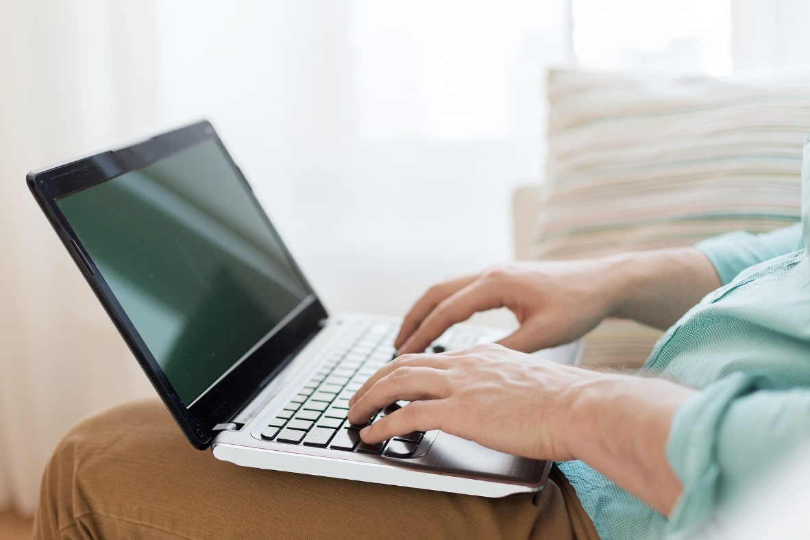 typing hands on a notebook computer